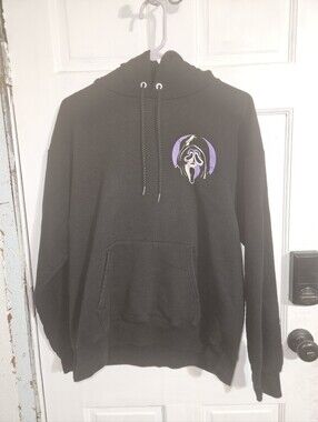 Black Hoodie Featuring A Tales From Woodsboro..medium